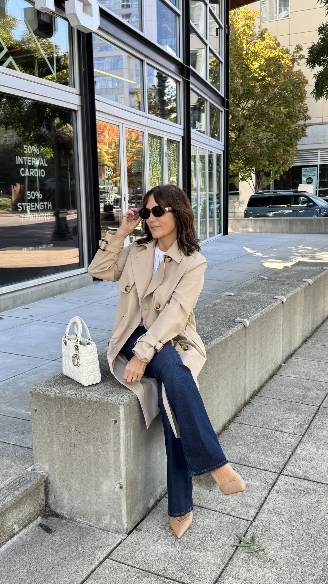 Susie wearing casual relaxed trench.