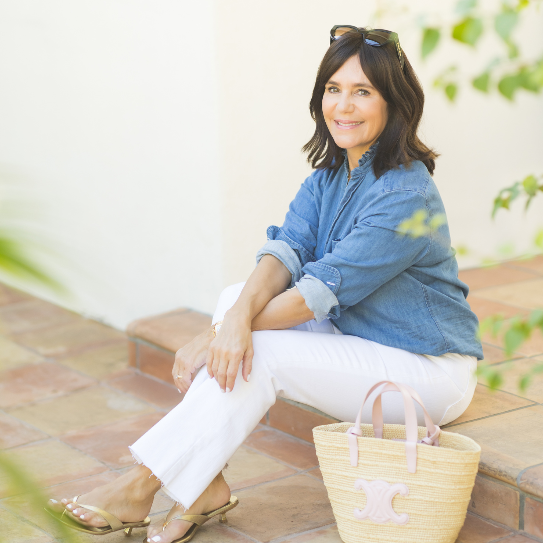 wearing an on-trend ruffle denim shirt for spring, spring denim styles